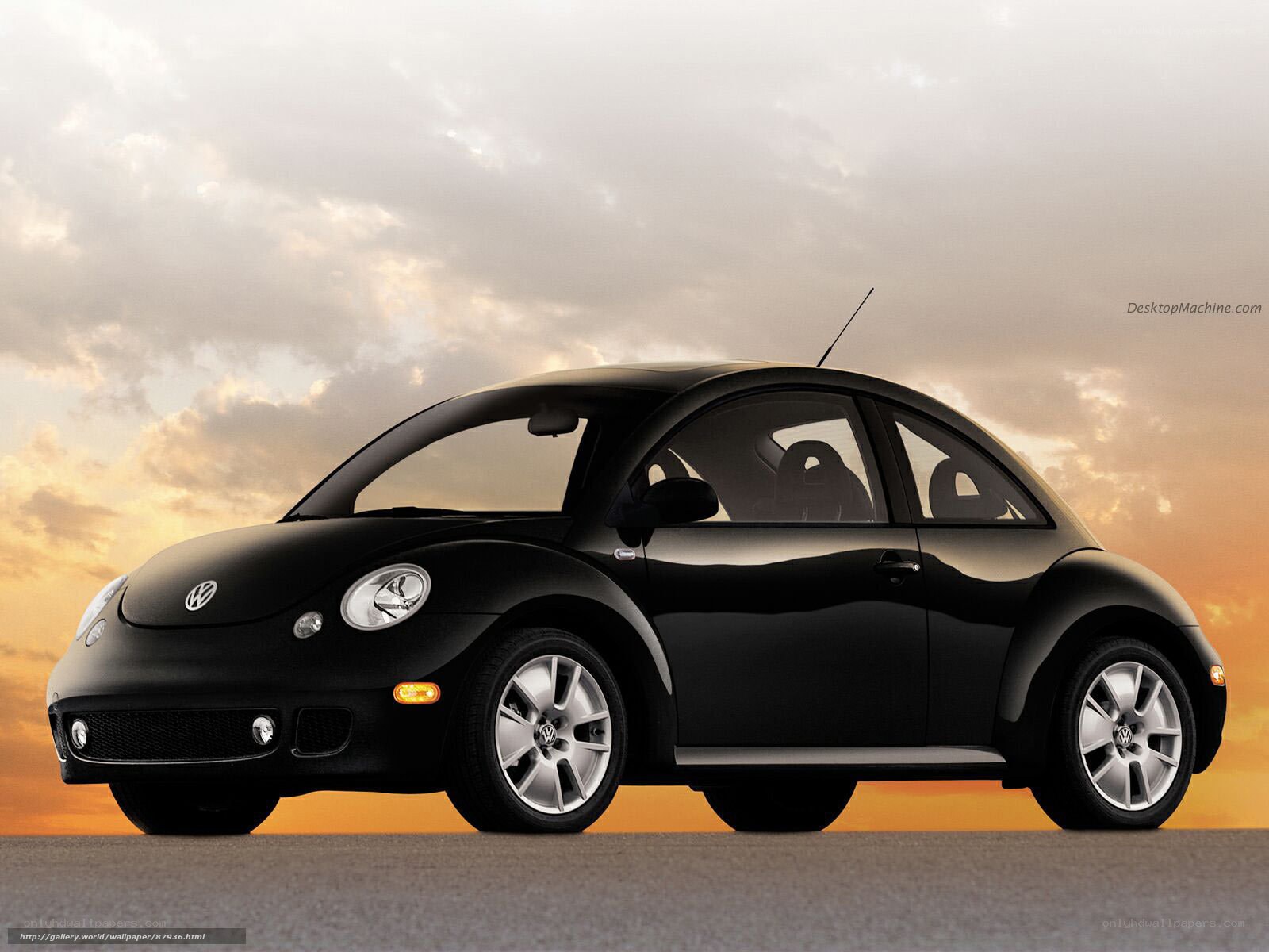 Black Volkswagen Beetle at sunset
