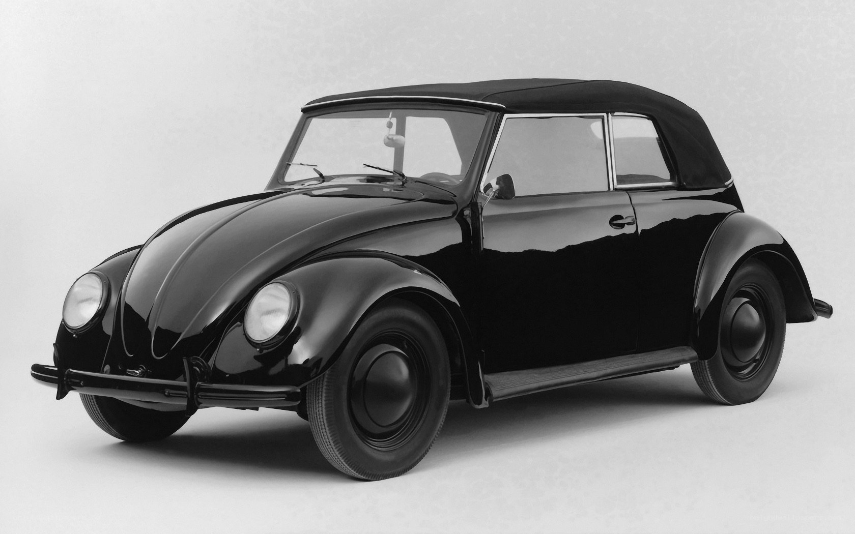 Black Volkswagen Beetle convertible
