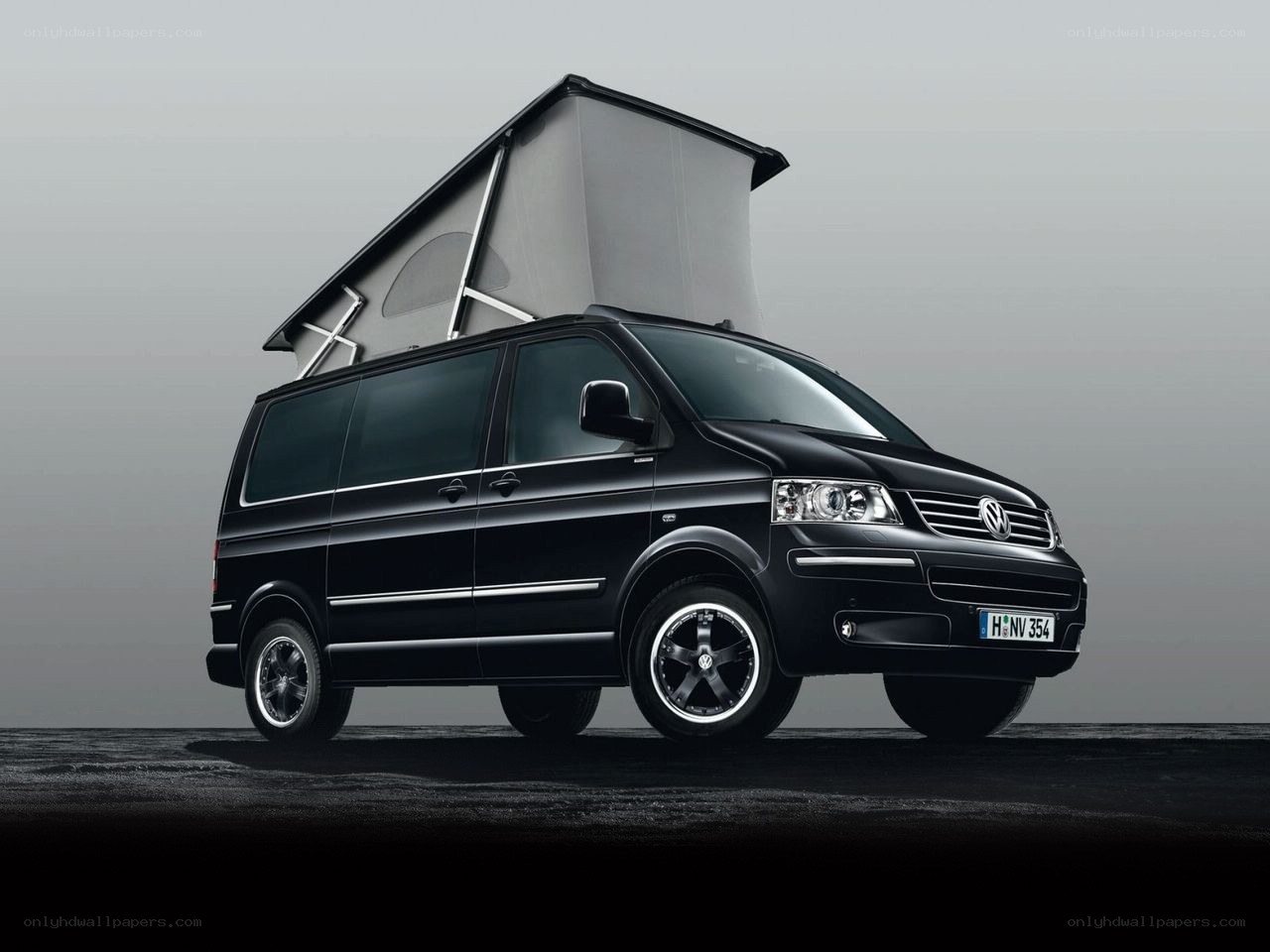 Black Volkswagen camper van