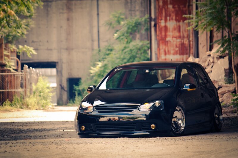 black volkswagen golf in urban setting