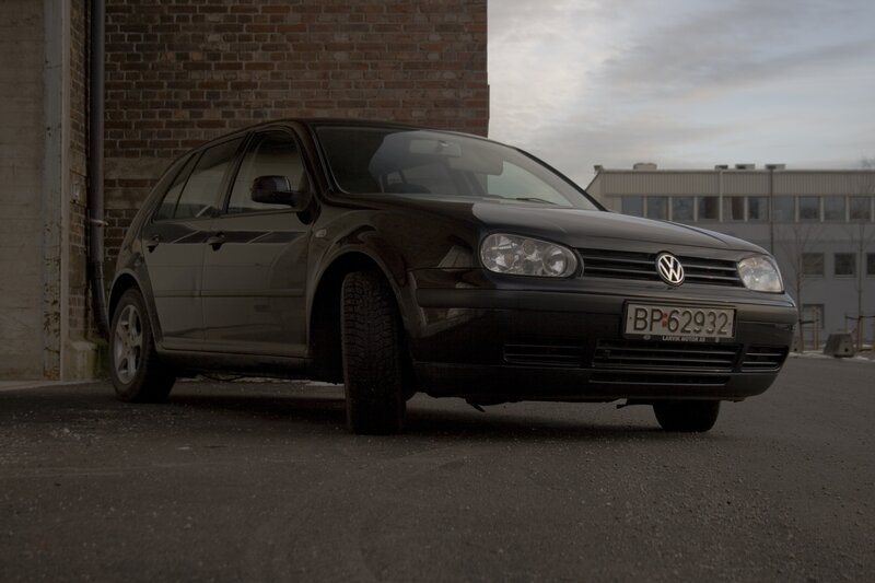 Black Volkswagen Golf parked outside