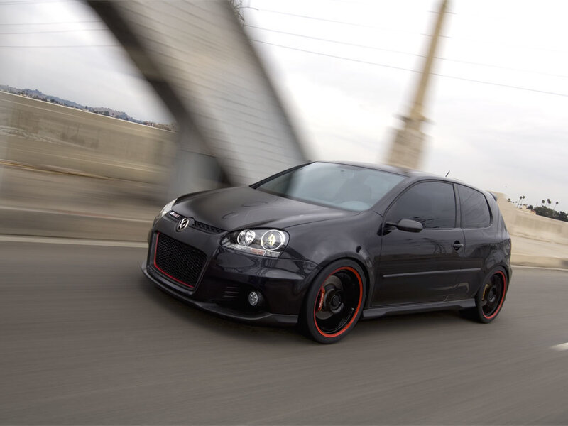 black volkswagen golf r32 in motion