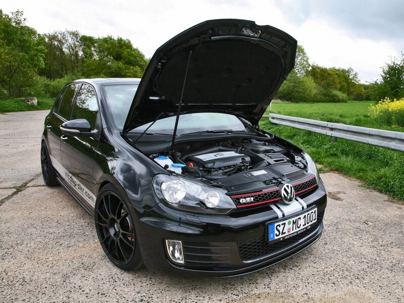 Black Volkswagen GTI with open hood
