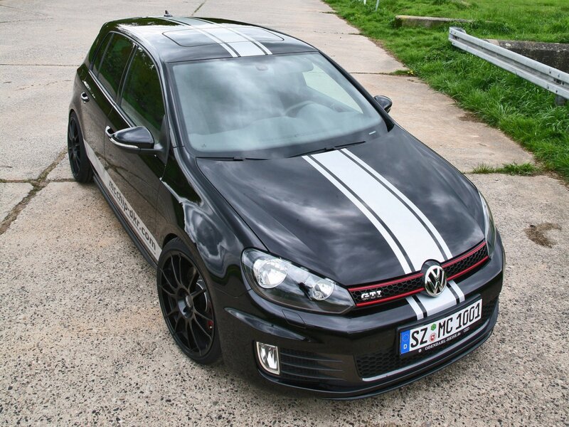black volkswagen gti with racing stripes