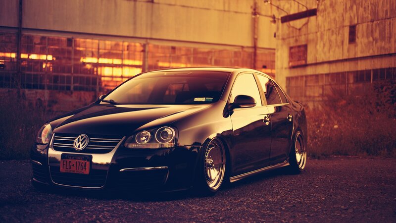 black volkswagen jetta in industrial setting