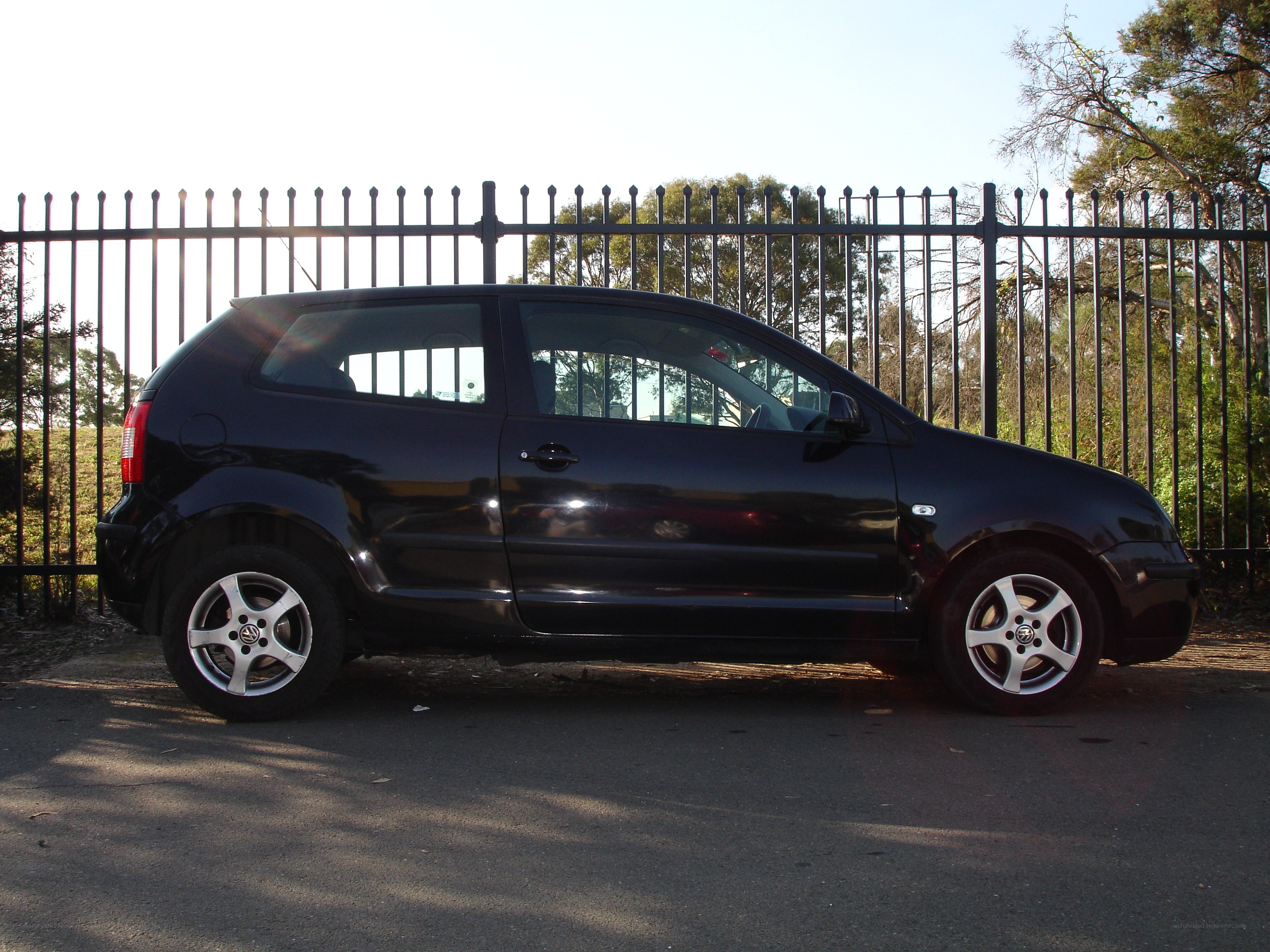 black volkswagen polo parked