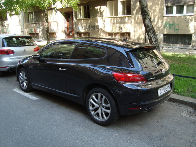 Black Volkswagen Scirocco parked on street