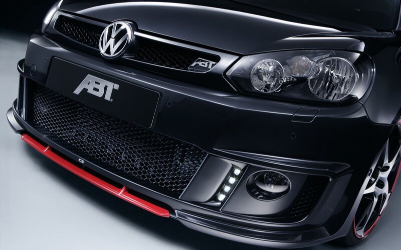 black volkswagen with abt styling