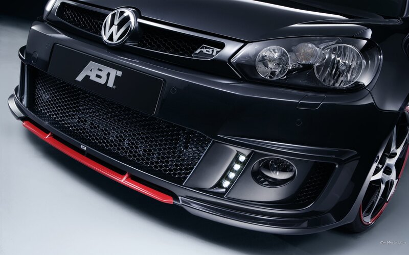 black volkswagen with abt styling