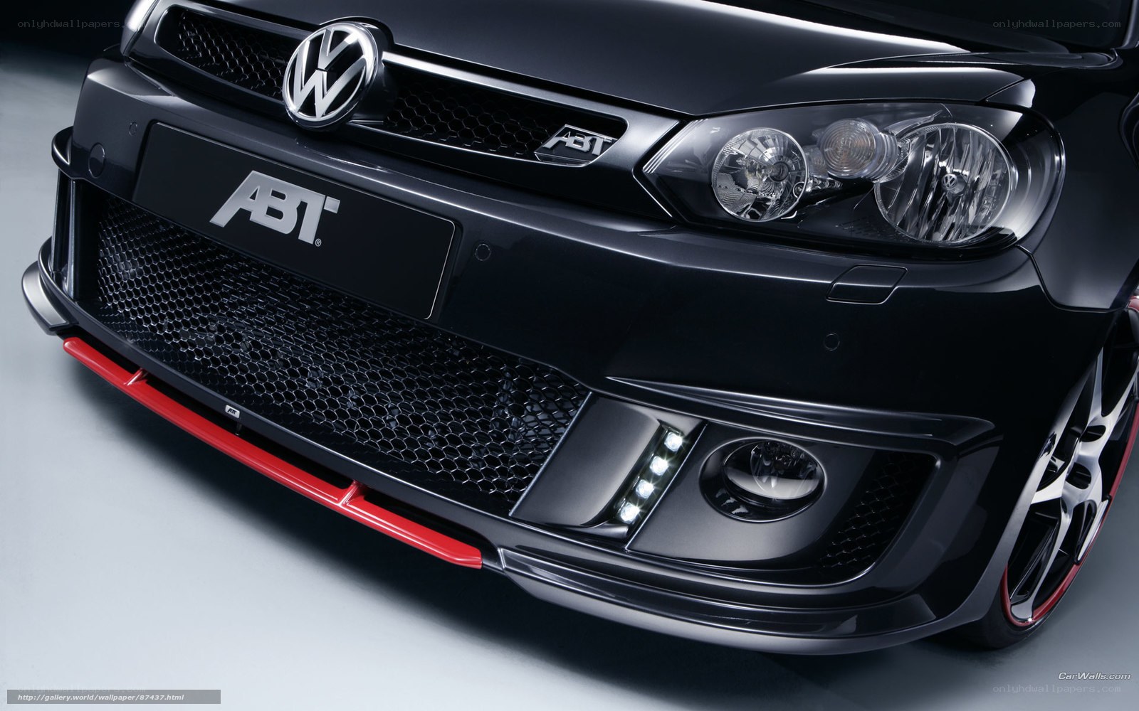 black volkswagen with abt styling