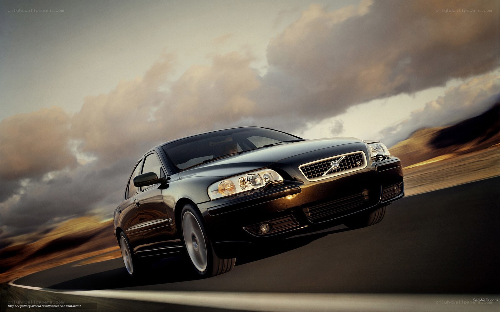 Black Volvo S60 in motion