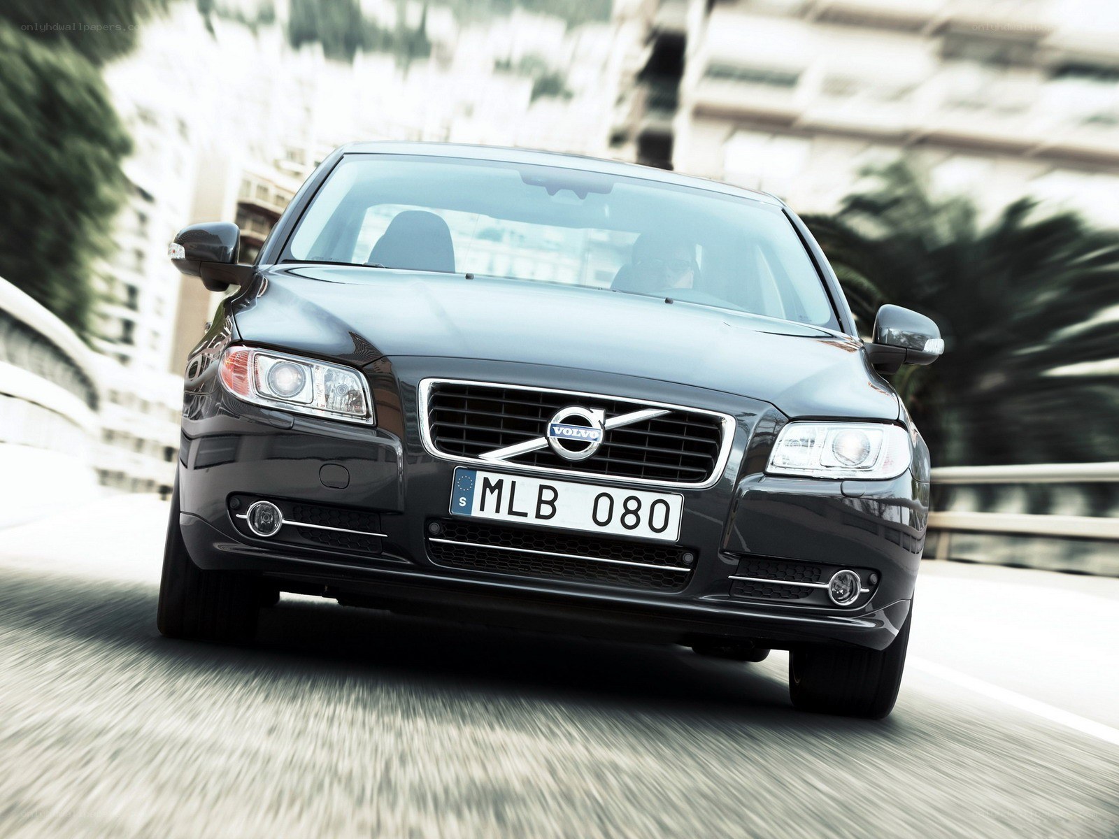 Black Volvo S80 in motion