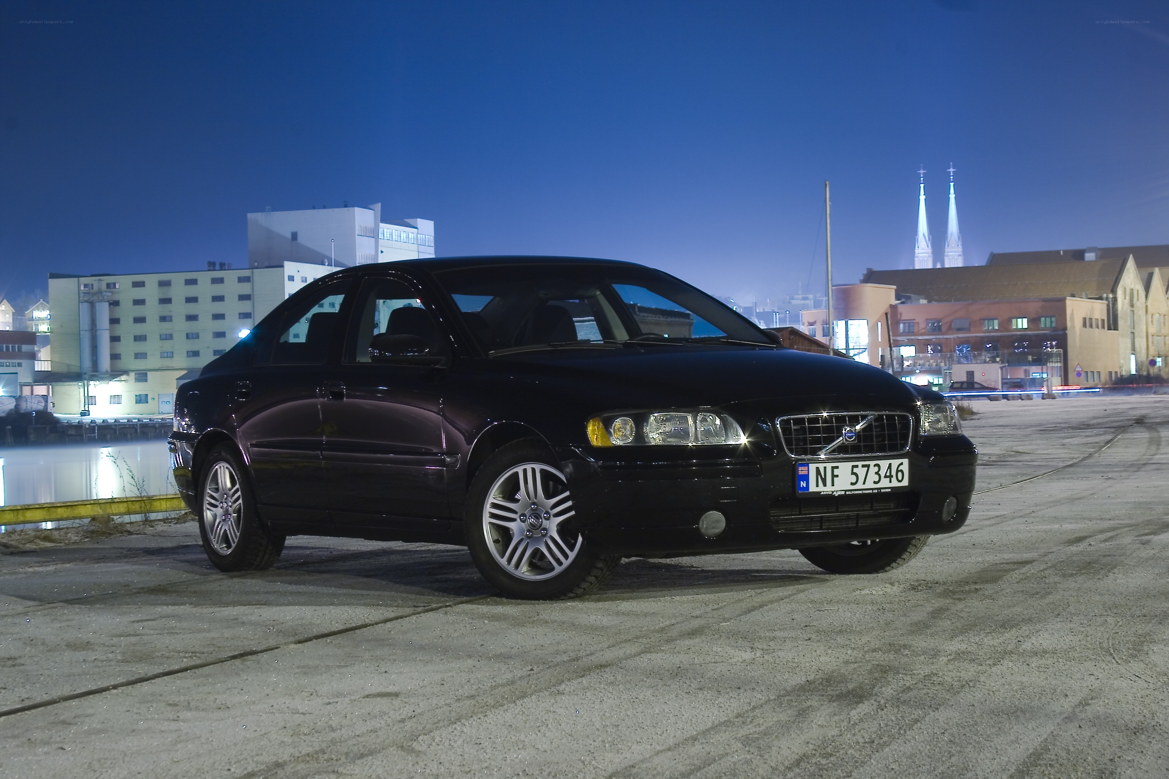 Black Volvo sedan at night