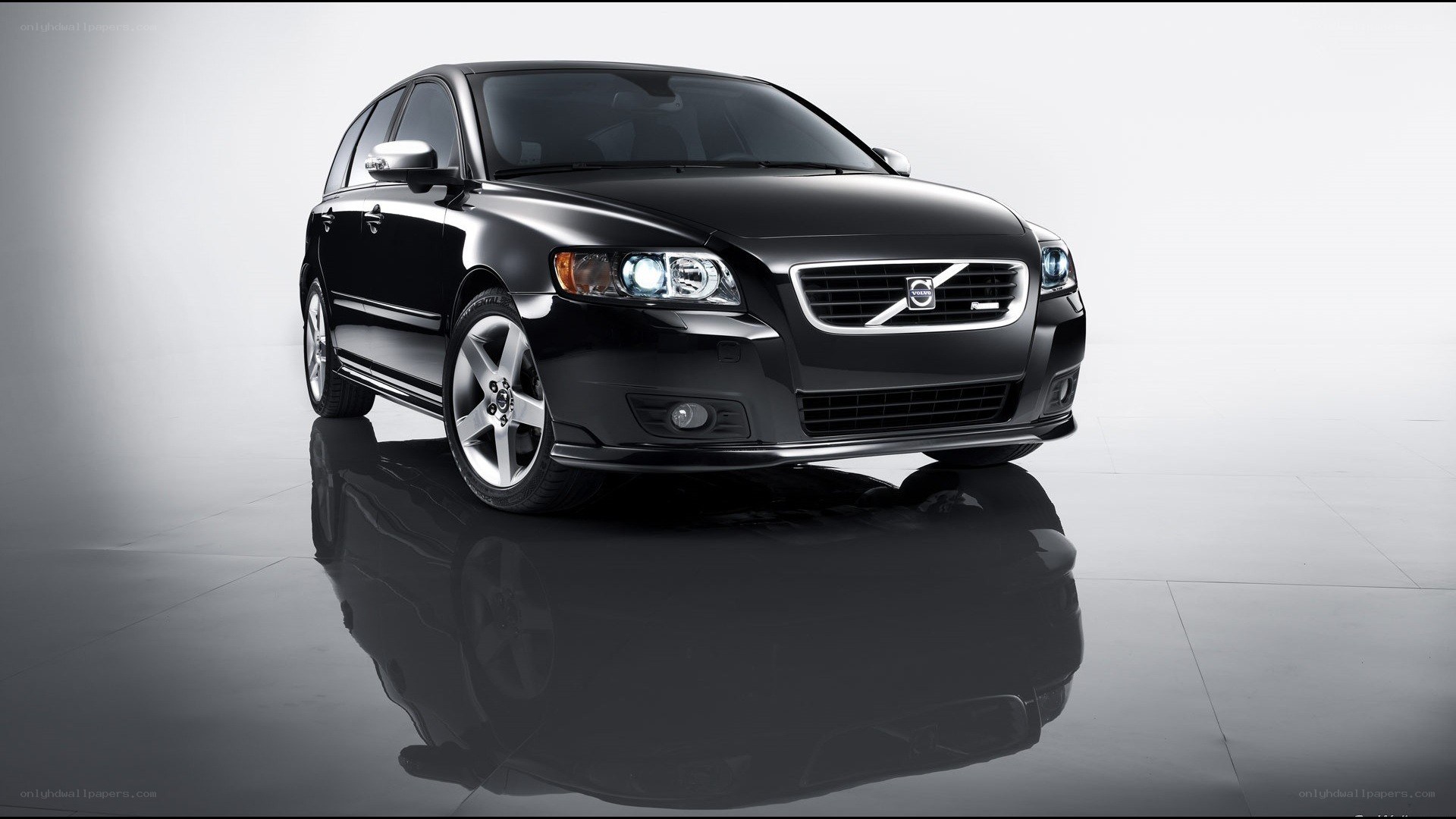 black volvo station wagon