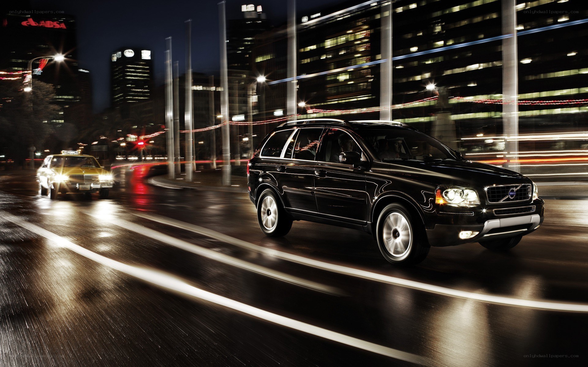 Black Volvo SUV at night