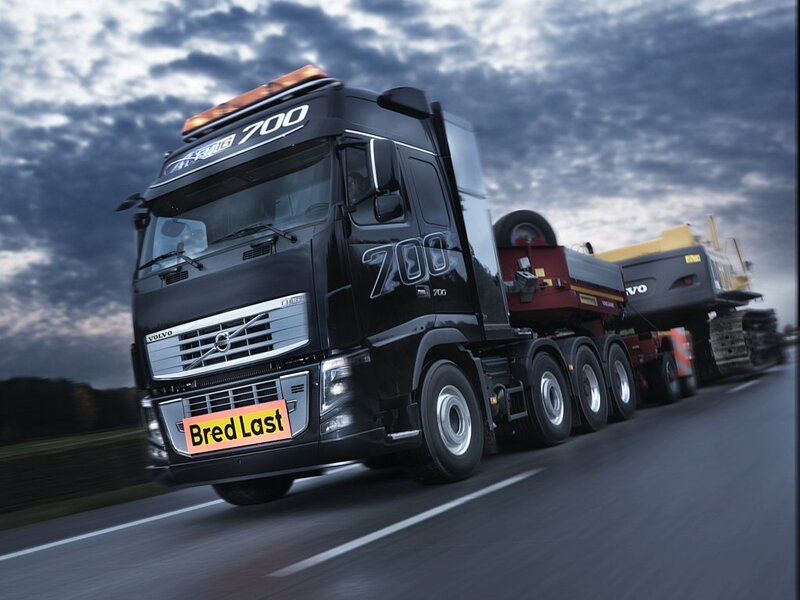Black Volvo Truck — Dramatic