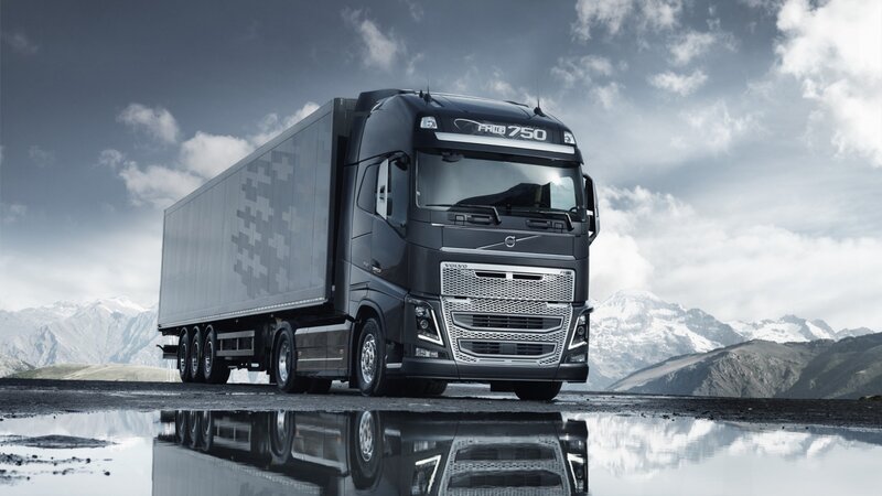 Black Volvo Truck — Gray