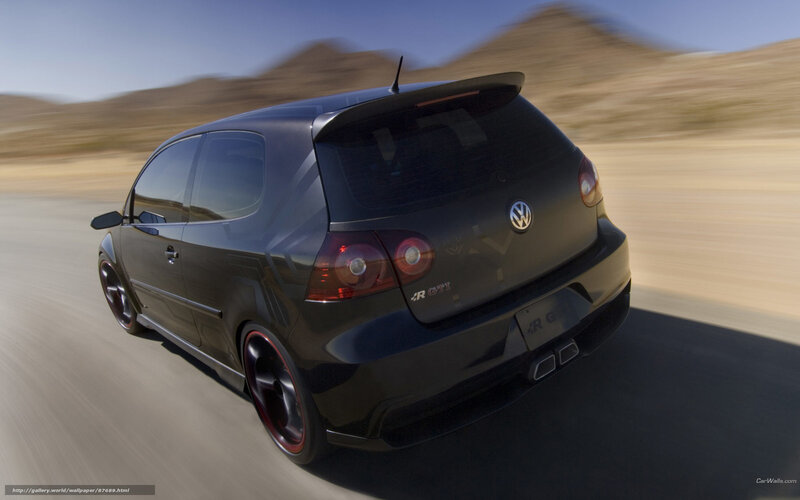 Black VW GTI in motion