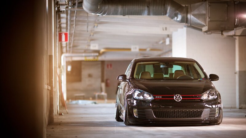 Black VW GTI in parking garage