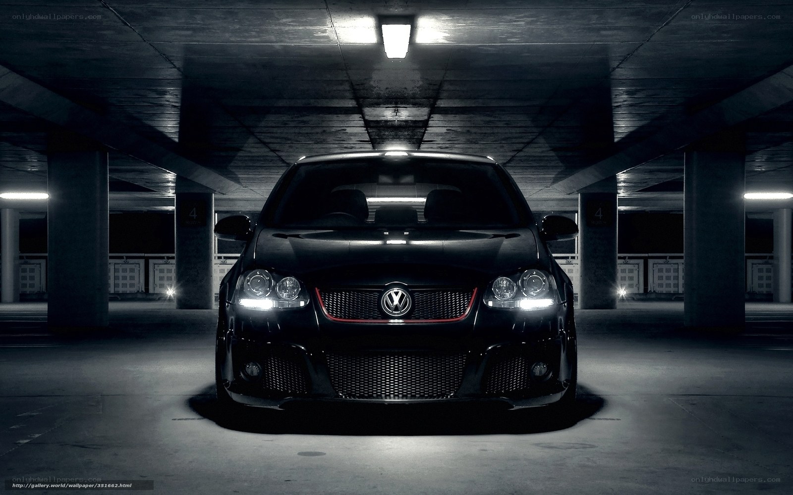 Black VW in parking garage