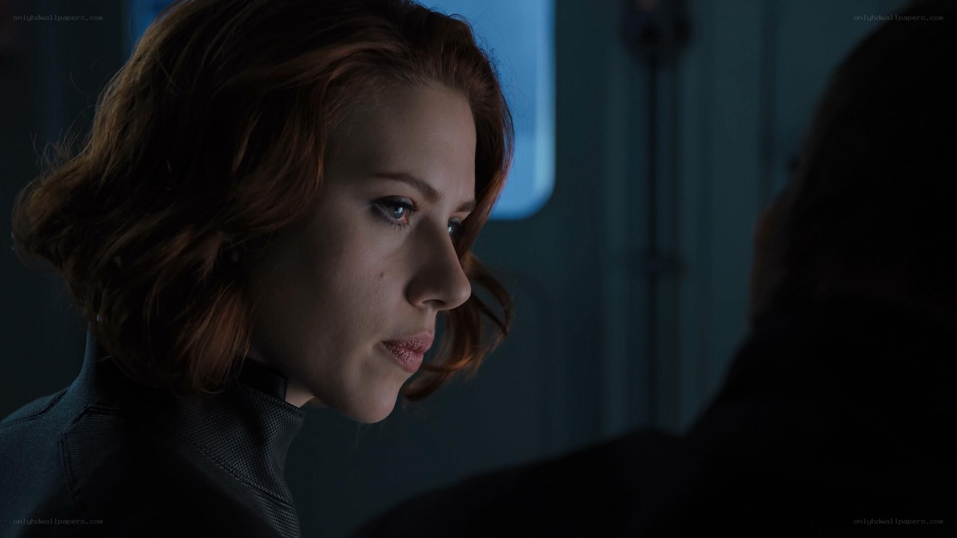 Black Widow in a dimly lit room