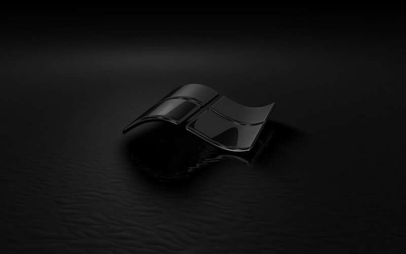 Black Windows logo on dark surface