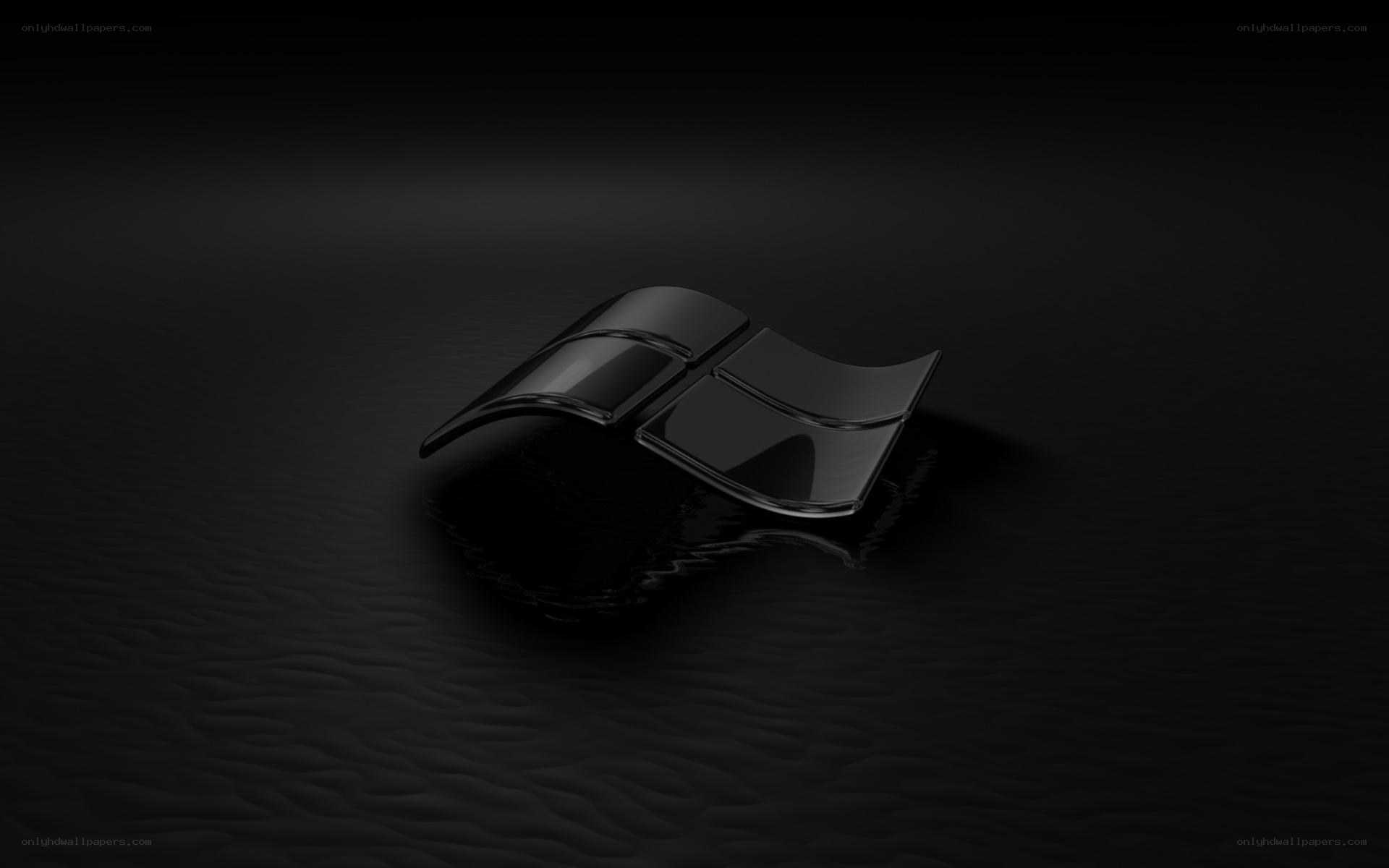 Black Windows logo on dark surface