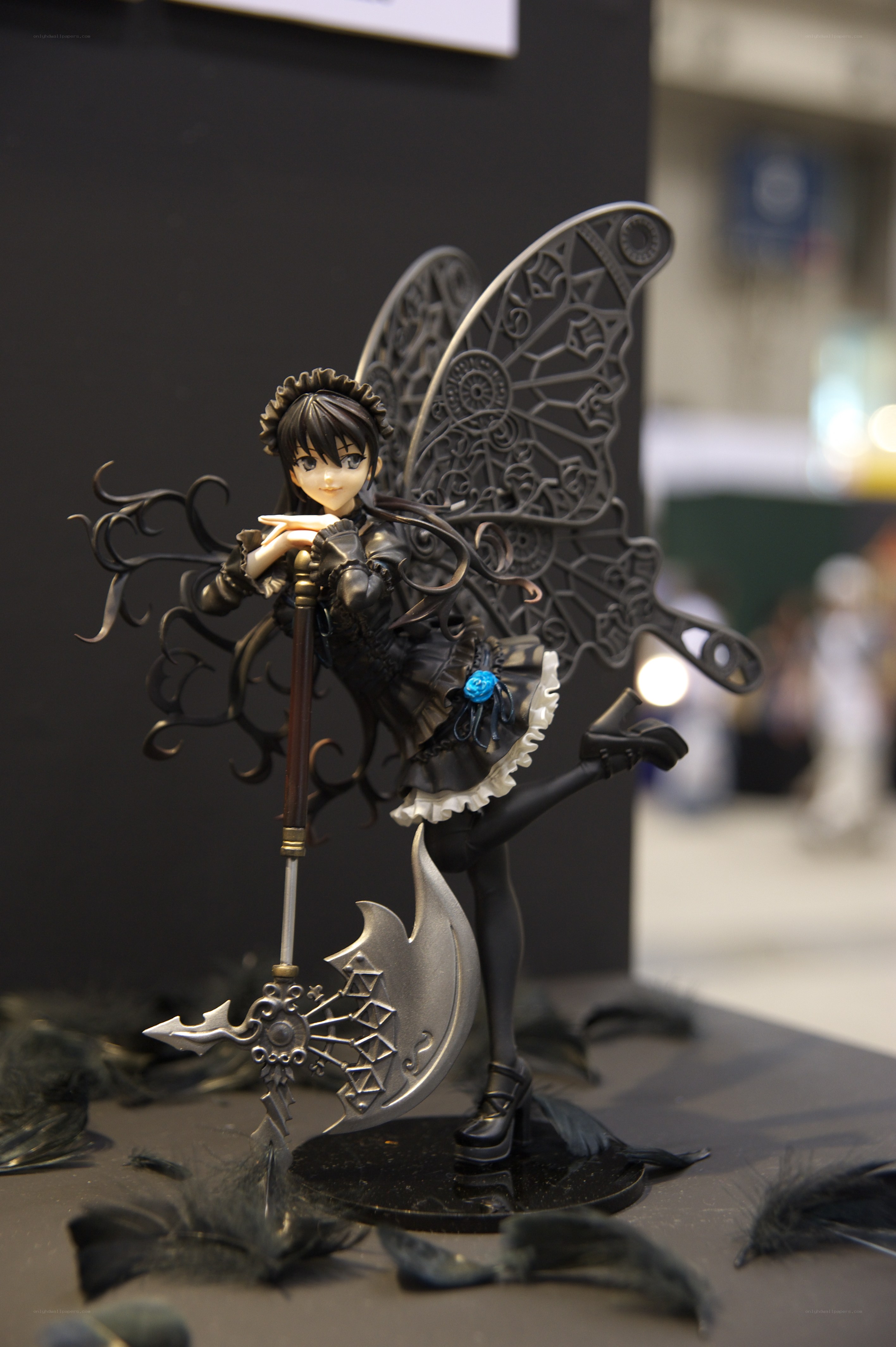 Black-winged anime figurine