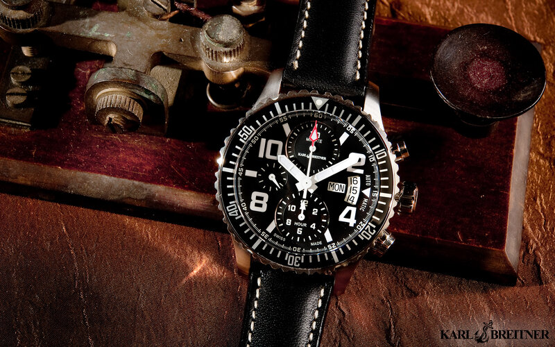 Black Wristwatch on Wood