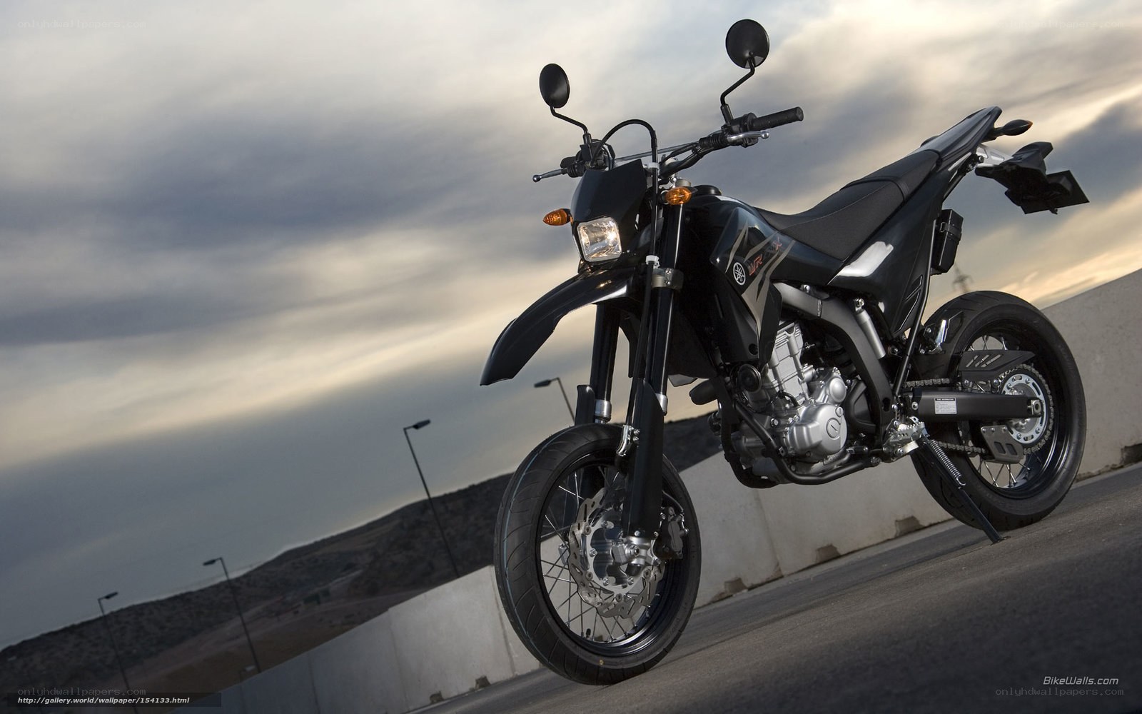 Black Yamaha motorcycle on road