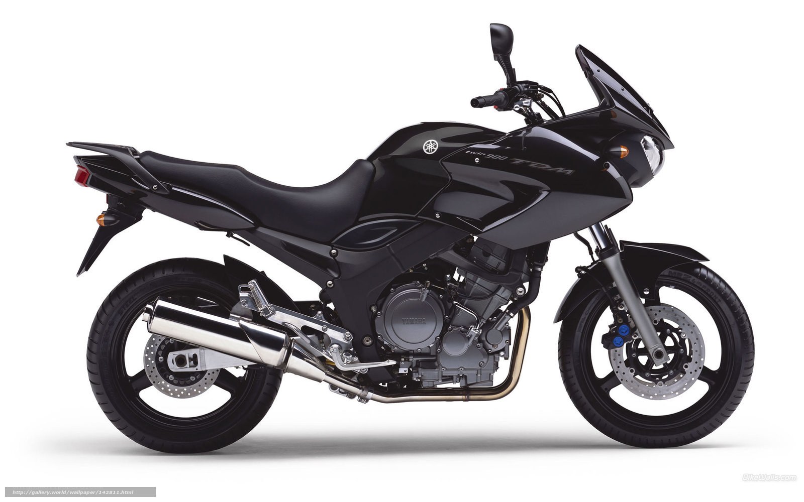 black yamaha tdm motorcycle