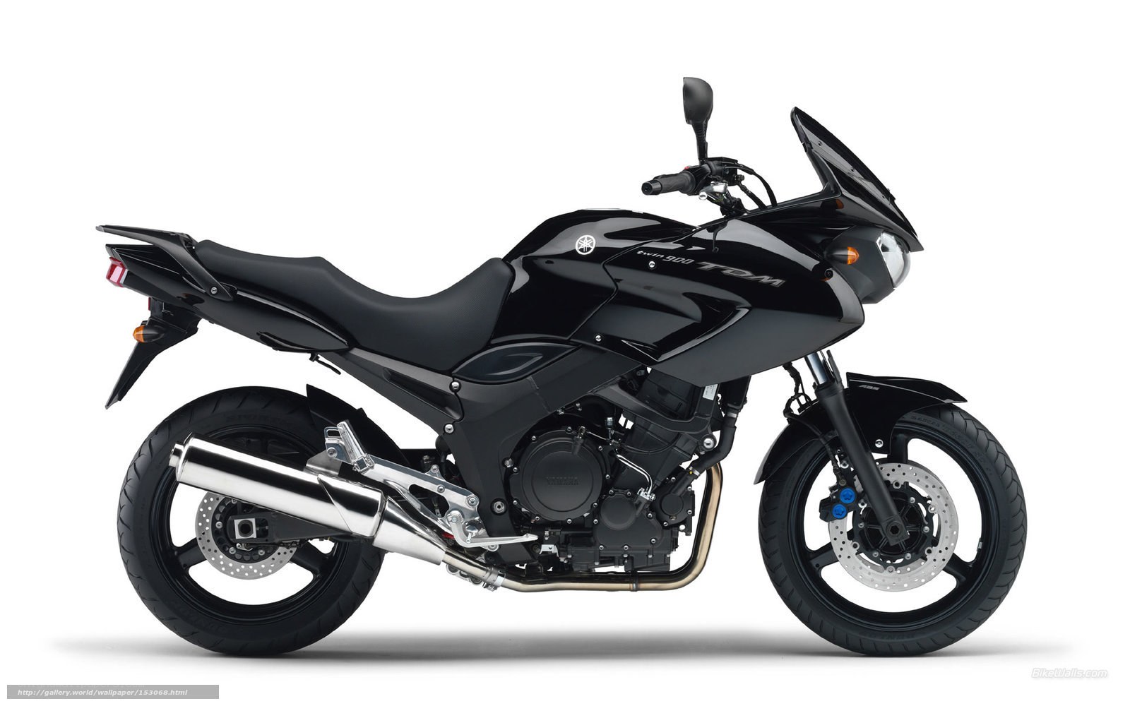 black yamaha tdm motorcycle