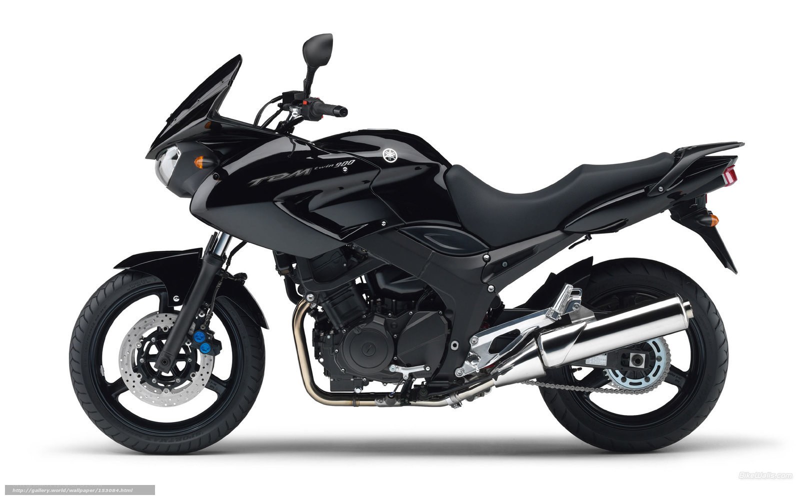 black yamaha tdm motorcycle