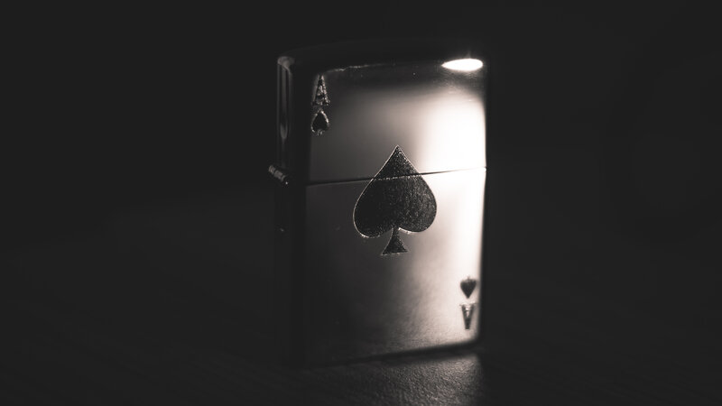 Black Zippo Lighter — Dramatic, Photograph