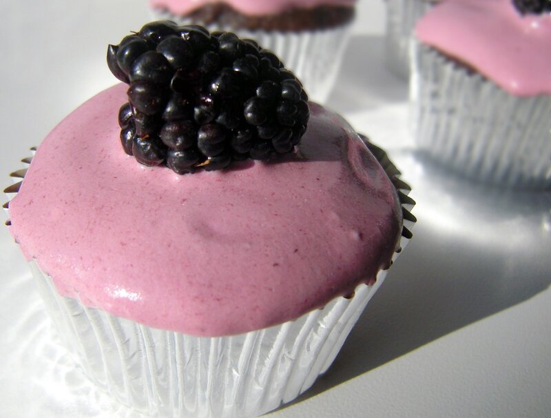 blackberry cupcakes with pink frosting
