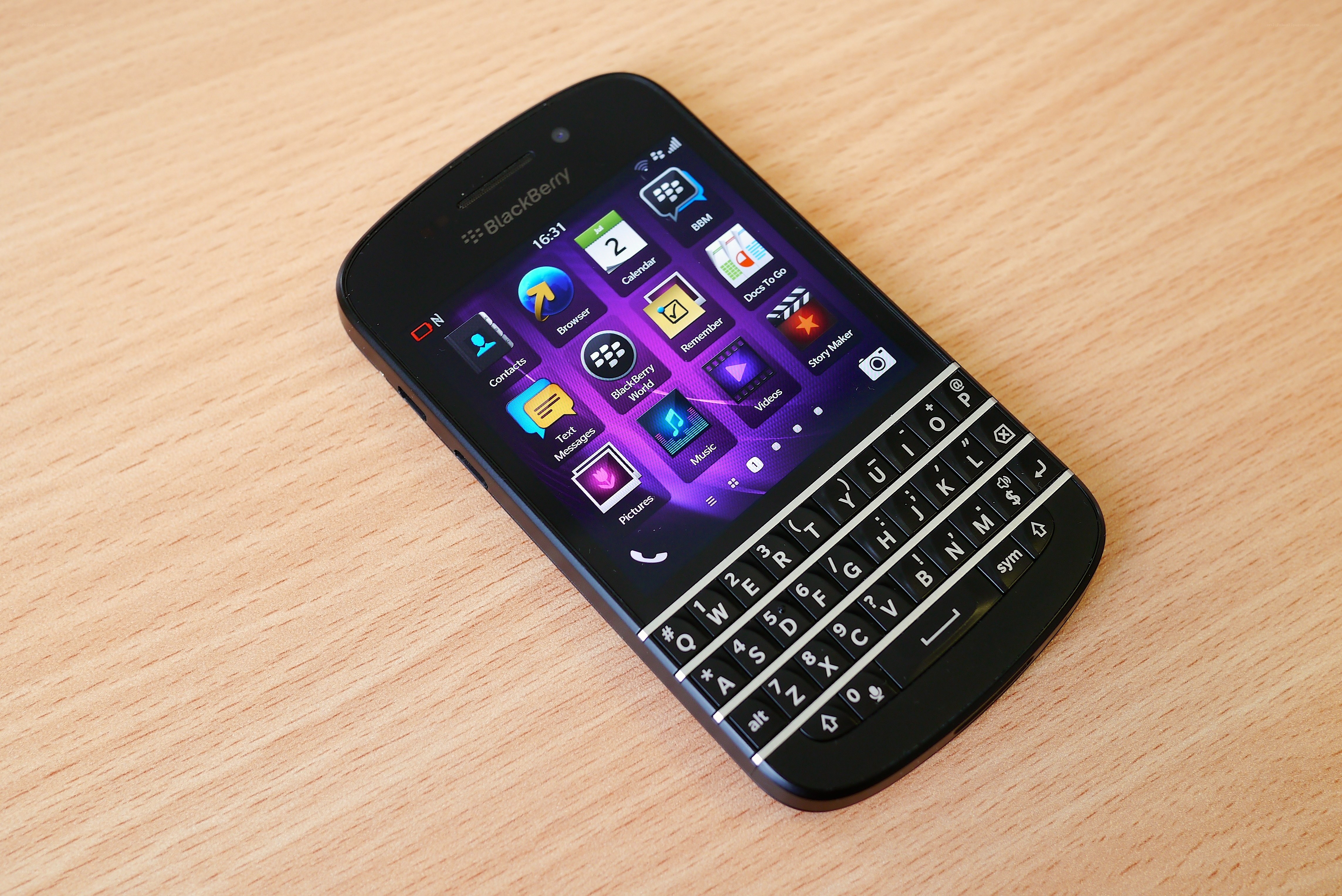 BlackBerry phone on wooden surface