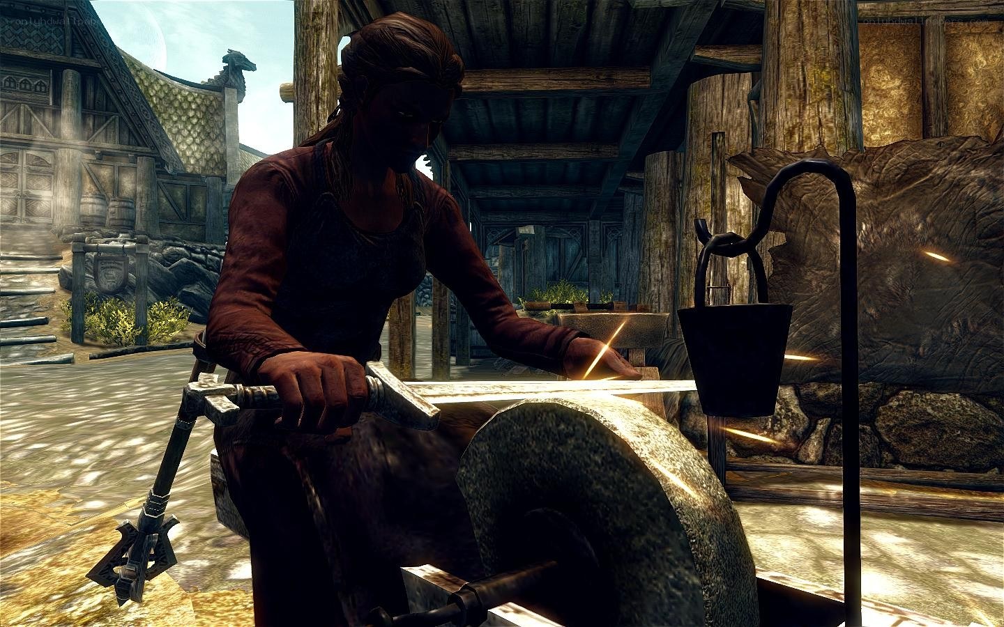 blacksmith sharpening a blade