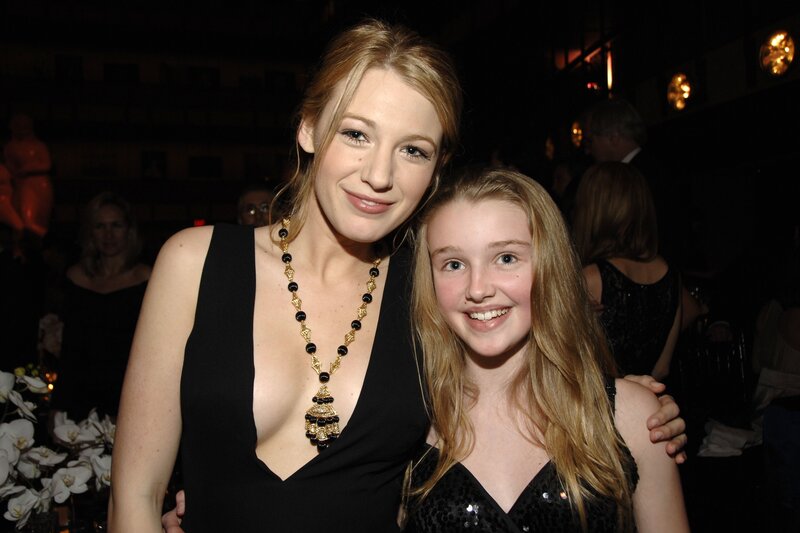 Blaire and a young girl at an event