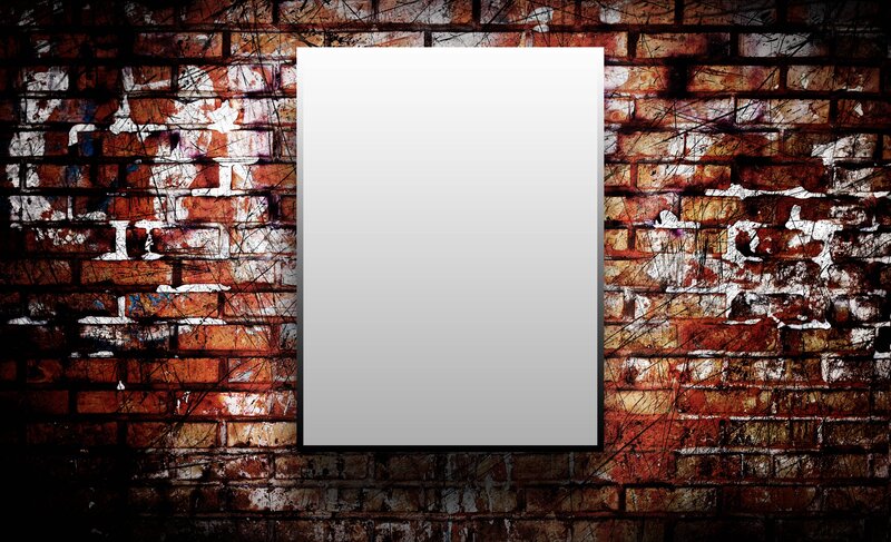 blank canvas on brick wall
