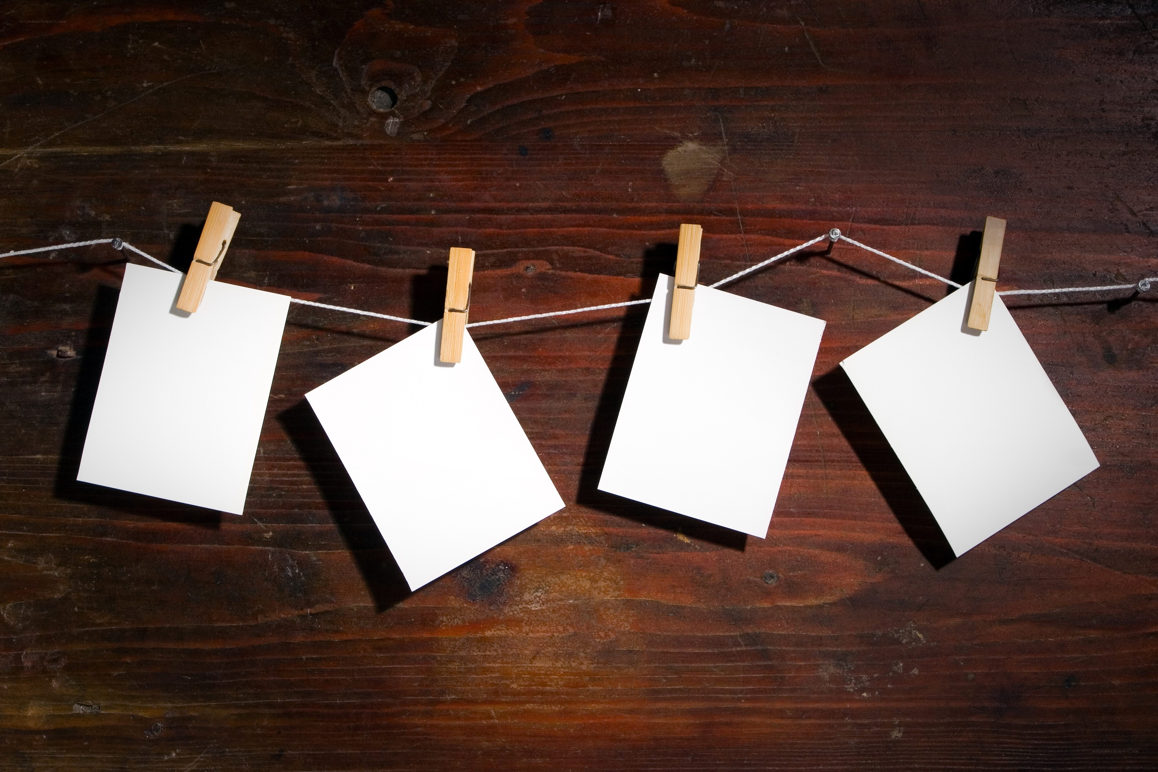 Blank cards on a clothesline