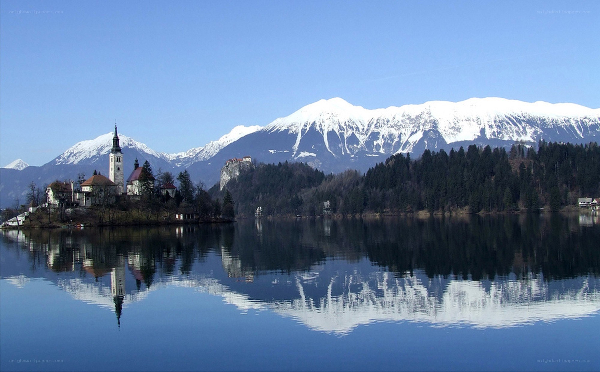 Bled Island and snow-capped mountains
