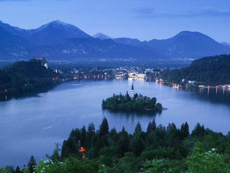 Bled Lake at dusk with castle and church