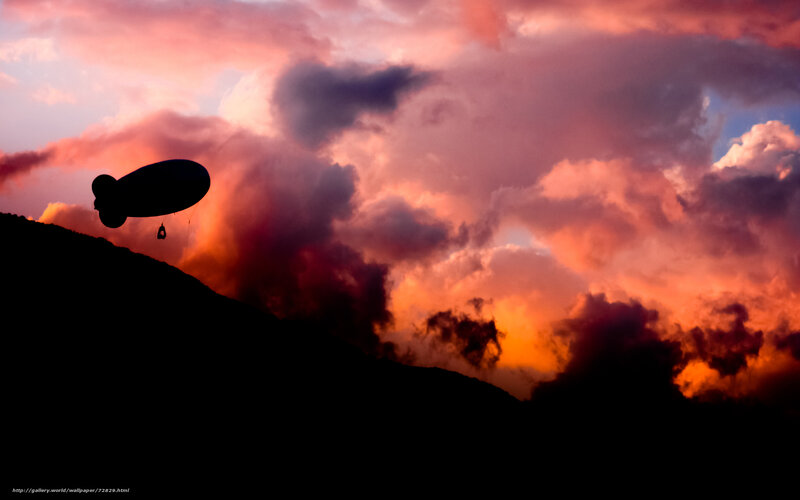 Blimp at sunset silhouette