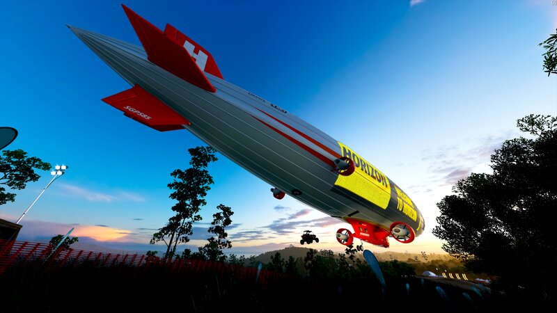Blimp Flying over Landscape