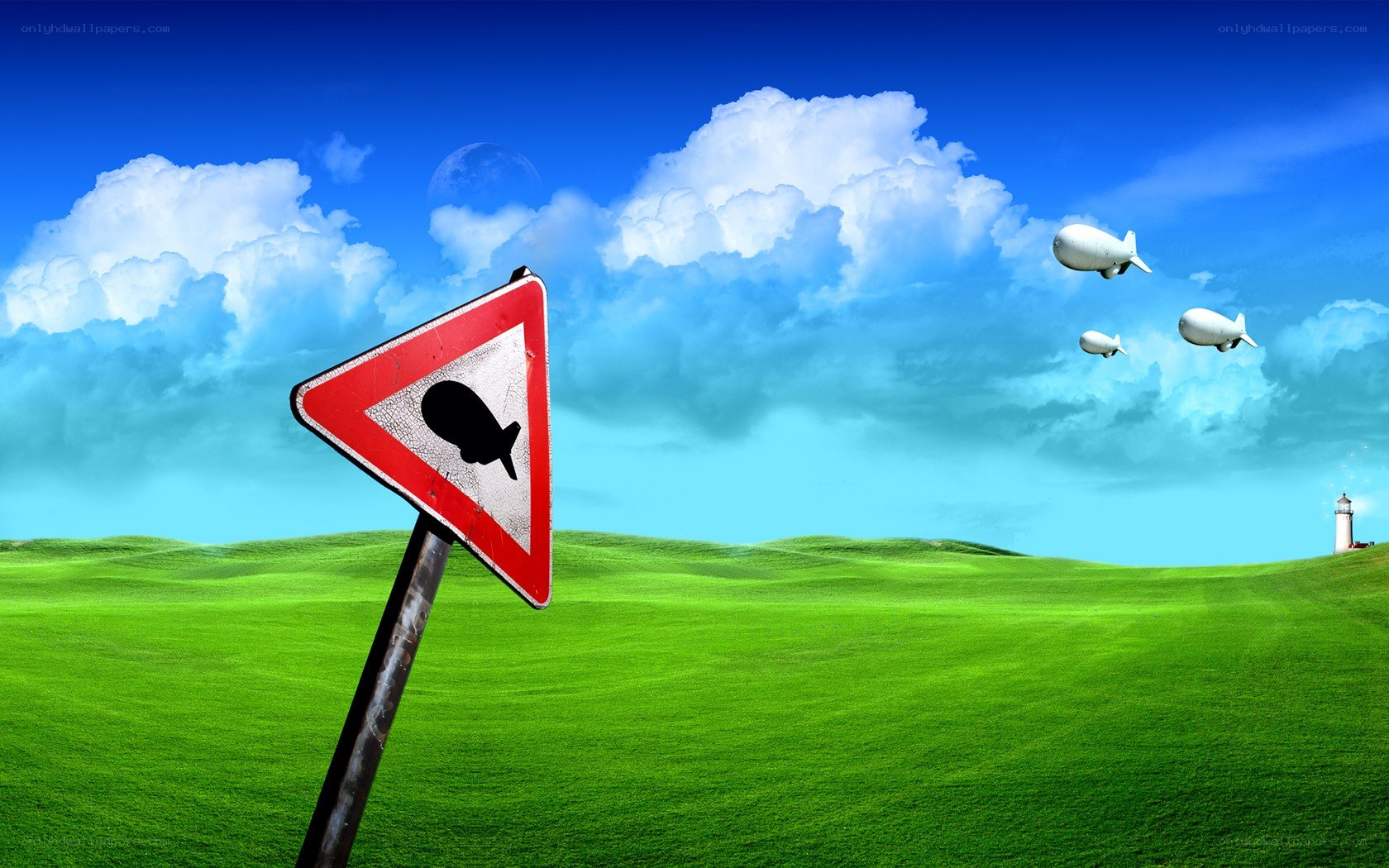Blimp warning sign in green field