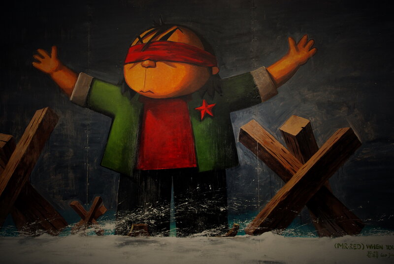 blindfolded boy with red star