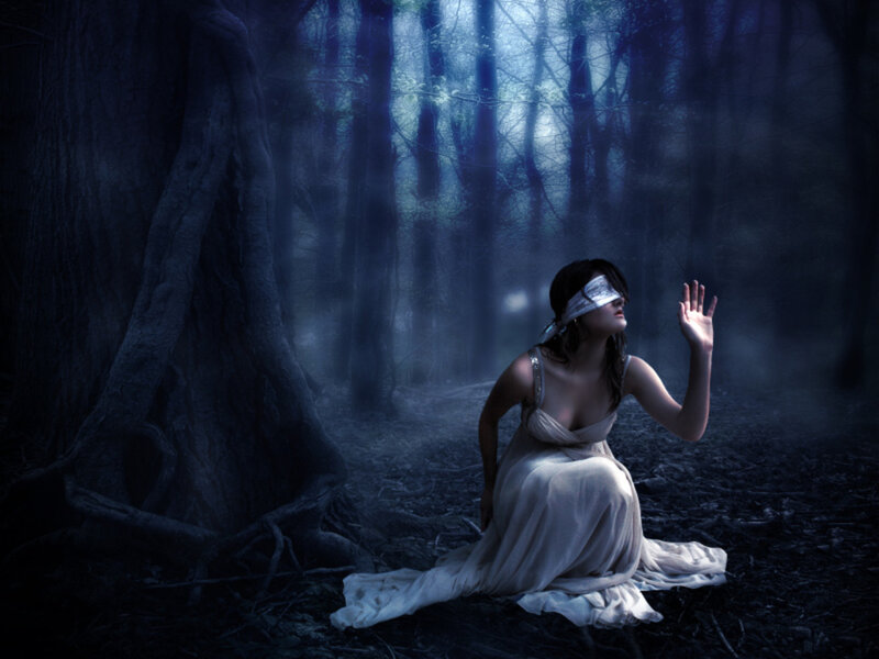 Blindfolded Woman in Forest