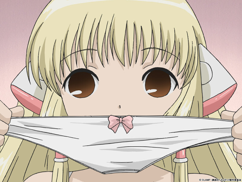 blonde anime girl holding cloth