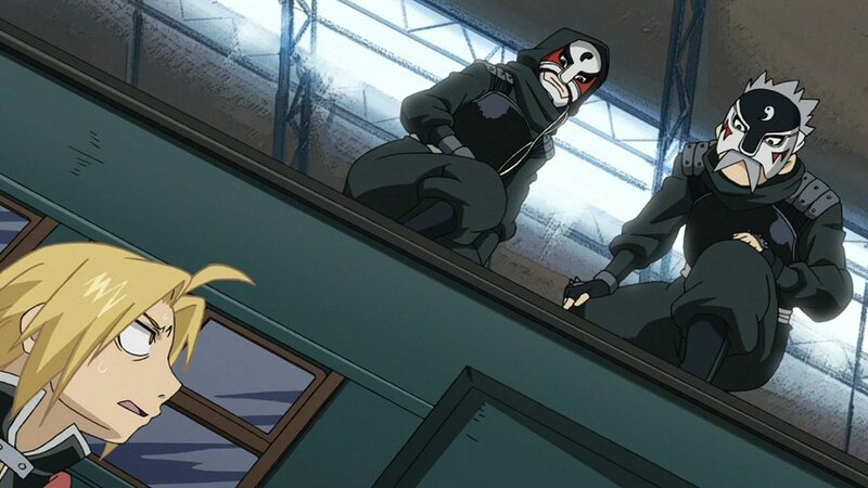 Blonde Boy Facing Masked Figures