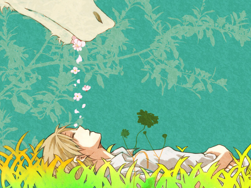 Blonde Boy Lying in Grass